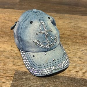 A bejeweled denim hat